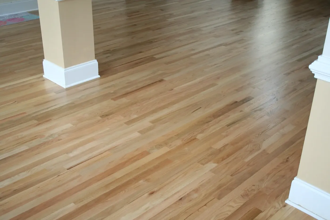 Newly installed hardwood floors in a living room