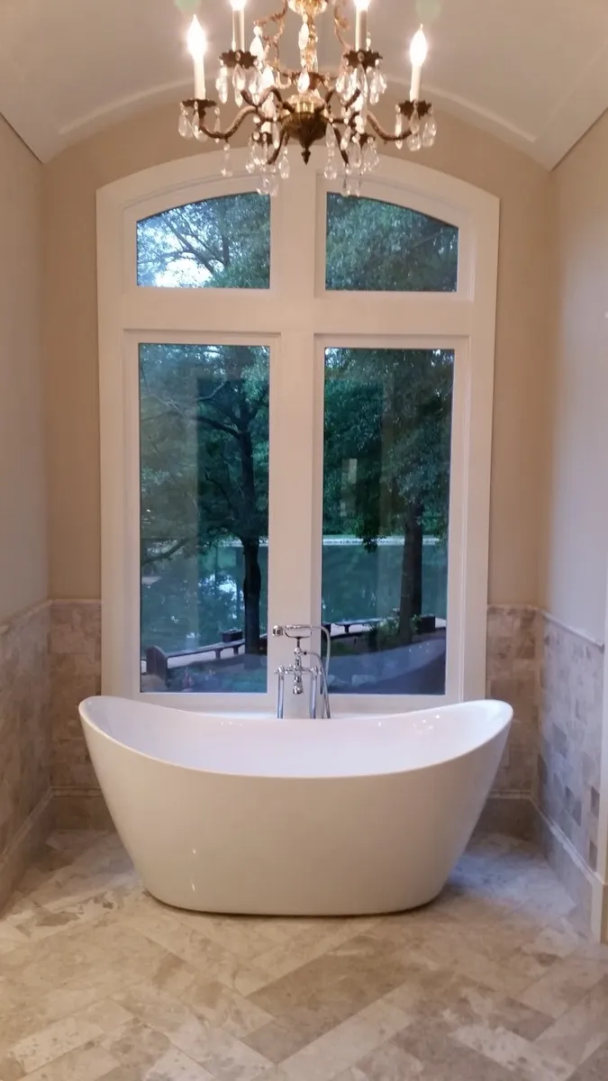 Marble Herringbone Bathroom with Chandelier