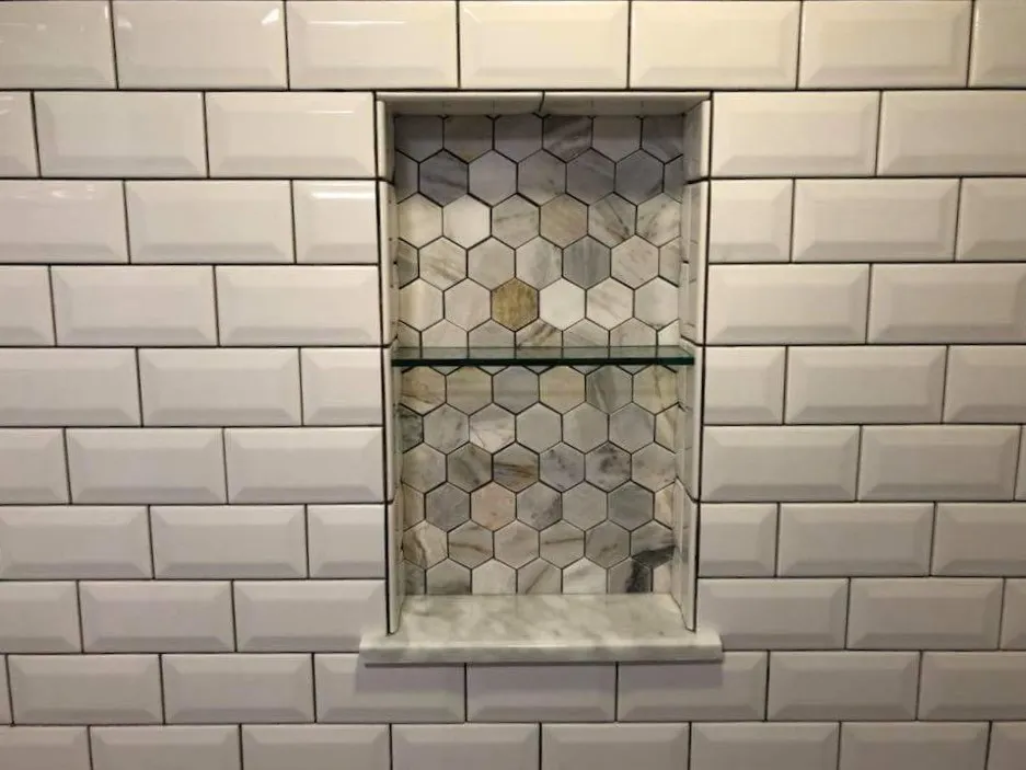 Subway Tile Shower with Marble Hex Niche